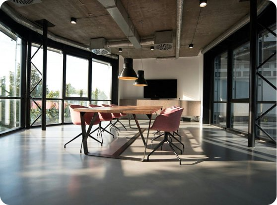 Modern office meeting space with natural lighting